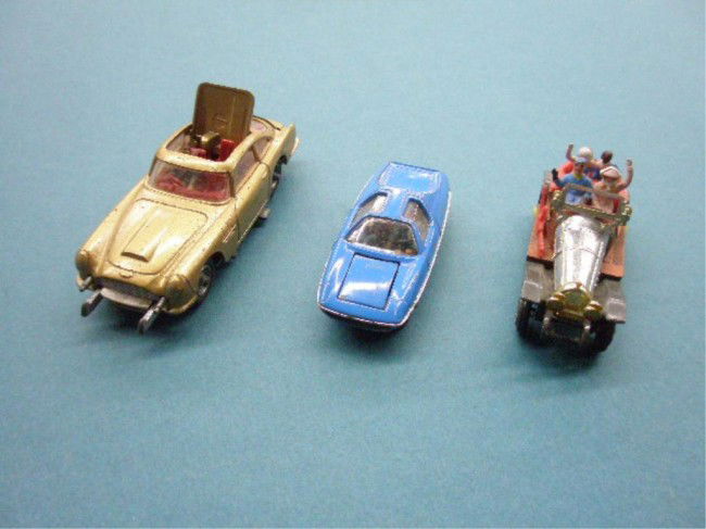1960's Husky & Corgi Diecast Cars: 1960's Husky Models & Corgi Toys diecast cars, Husky The Man From Uncle, Corgi James Bond Aston Martin DB5 & Chitty Chitty Bang Bang. Condition: All have some form of wear & or loss.