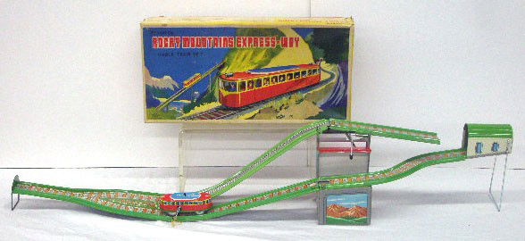Japanese Wind-Up Rocky Mountain Express-Way: 1960's S & E Japanese lithographed tin wind-up Rocky Mountain Express-Way Cable Train set w/origianl box. Condition: Very good w/minor wear, works, box has wear & tearing.