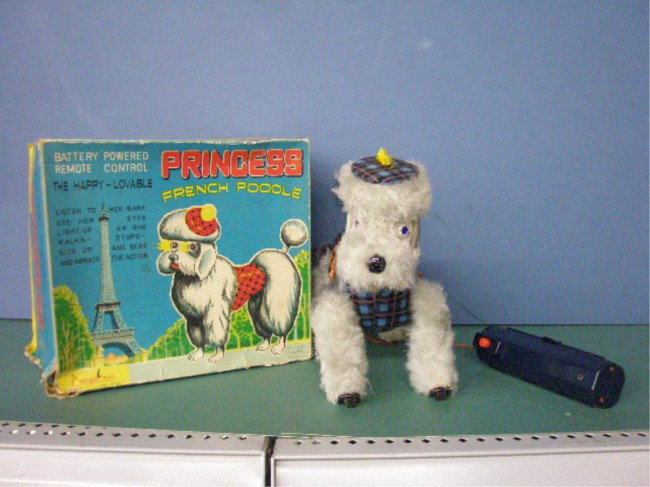 1950's Battery Operated Princess The French Poodle: 1950's Alps Co. Japanese plush battery operated Princess The French Poodle w/original box. Condition: Very good, works, box has wear & tearing.