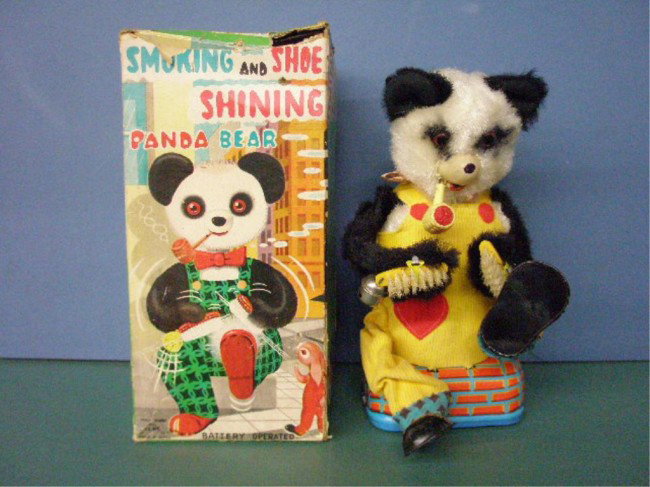 1950's Smoking And Shoe Shining Panda Bear: 1950's Alps Co. Japanese plush & lithographed tin battery operated Smoking And Shoe Shining Panda Bear w/original box. Condition: Very good with minor wear, works, box has wear & tearing.