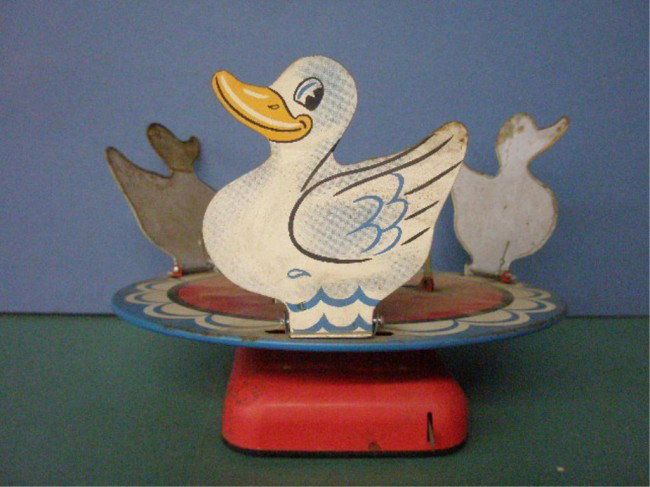 Linemar Battery Operated Duck Shooting Game: 1950's Linemar Japanese lithographed tin battery operated Duck Shooting target game. Condition: Not working, no guns or darts, areas of wear & loss.