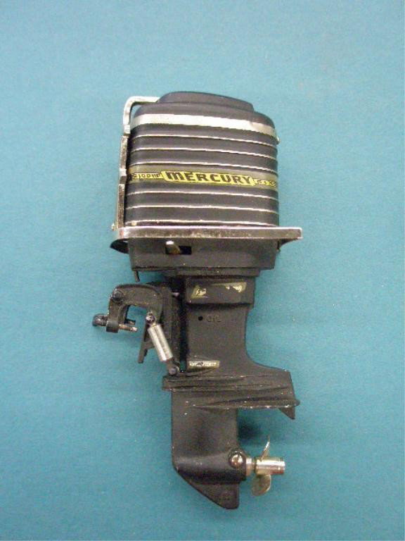 1962 Mercury Outboard Toy Boat Motor: 1962 K & O Mercury Six 100 HP outboard model toy boat motor, made in Japan. Condition: Areas of wear & decal loss, not known if it is in working condition.