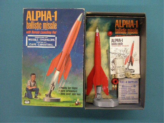 1963 Alpha - 1 Ballistic Missile: 1963 Amsco Industries Alpha - 1Ballistic Missile w/original box. Condition: Missing rocket oxidizer & measuring tank, box has wear.