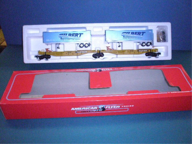 American Flyer/Lionel Gilbert Intermodal Set: 1996 American Flyer by Lionel "S" gauge #48514 Gilbert Intermodal TTUX set w/original box. Condition: Very good, box has minor wear.