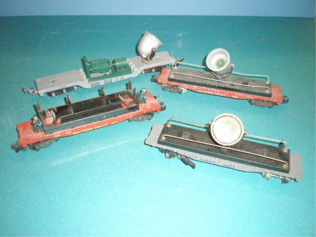 1940's & 1950's American Flyer Flatcars: 1950's & 1950's American Flyer "S" gauge Flatcars, #634 type 3 C. & N. W. Ry. Search Light Car, #646 type 7 Erie Search Light Car, #934 Southern Pacific Search Light Car & 971 type 1 Southern Pacific 