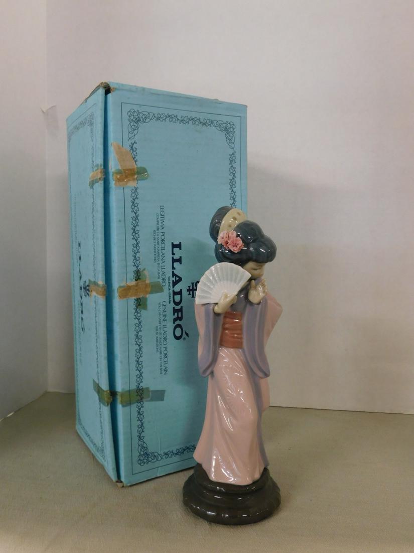 Signed Lladro Porcelain Figurine (1 of 2)