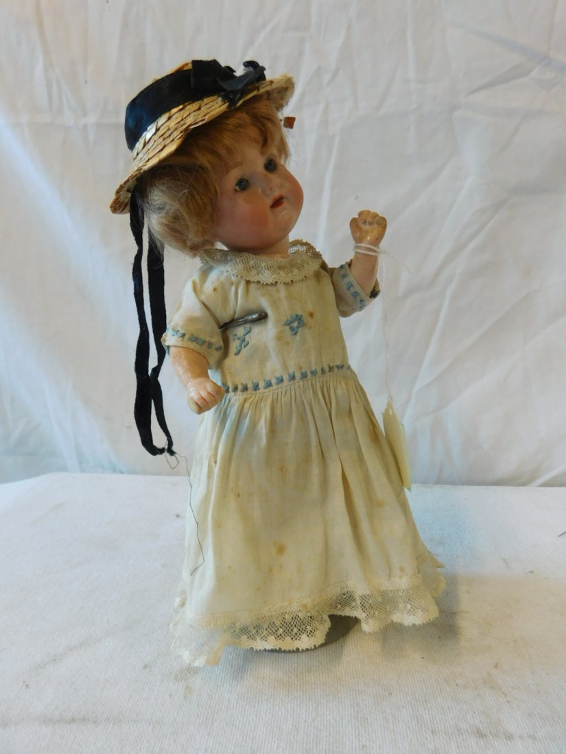 Armand Marseille Bisque Head Doll: Armand Marseille Bisque Head Doll, Germany, 990, 9/0, socket head blue sleep eyes, open mouth with teeth, blond wig, composition baby body, 9", vintage blue cross - stitched with gown undergarments. C