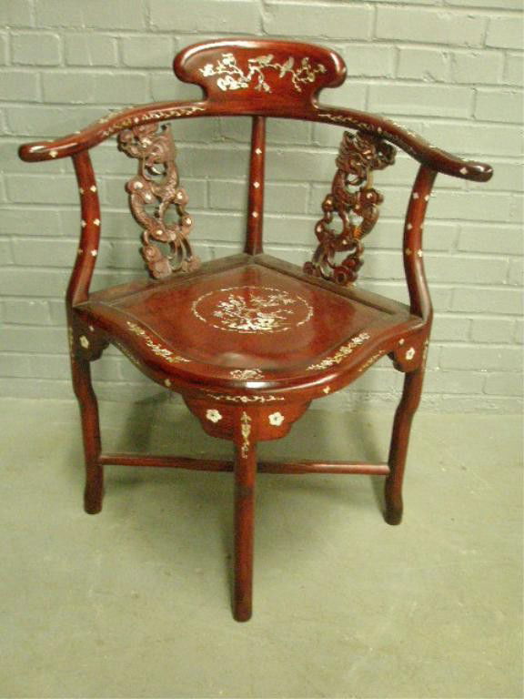 Chinese Rosewood Corner Chair: Chinese Rosewood corner chair, floral & bird mother of pearl inlay, Dragon carved splats, mid 20th c. Condition: Minor mother of pearl repair & loss on seat.