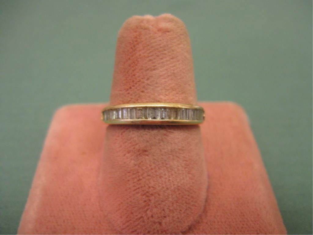 14K YG Diamond Band: 14k yg diamond band, approx 1/2 ct TW baguette diamonds half around, 1/8" width, size 6 1/4", 1.5 DWT. V.G. normal wear.