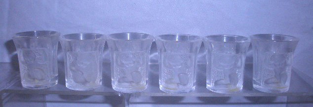 Lalique Enfants Shot Glasses: Set of 6 Lalique signed frosted glass 2" #13400 Enfants shot glasses. Condition: Very good with no damage.