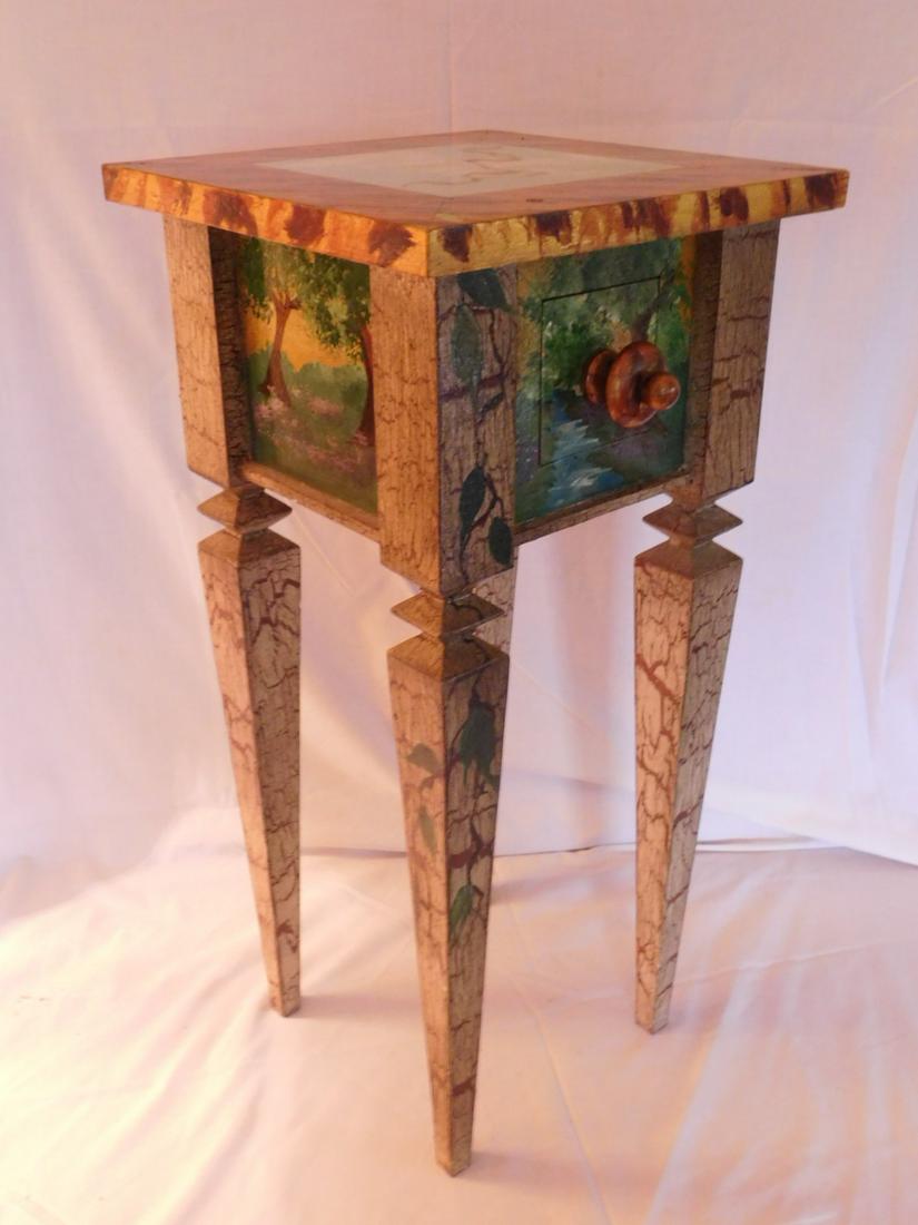 Crafts style end table: Crafts style end table, grain and foliate distressed painted over all, single drawer, tapered legs, 12" x 12" x 25". Condition; small areas of paint wear. NOTE: NO SHIPPING ON THIS LOT. LOCAL PICKUP O