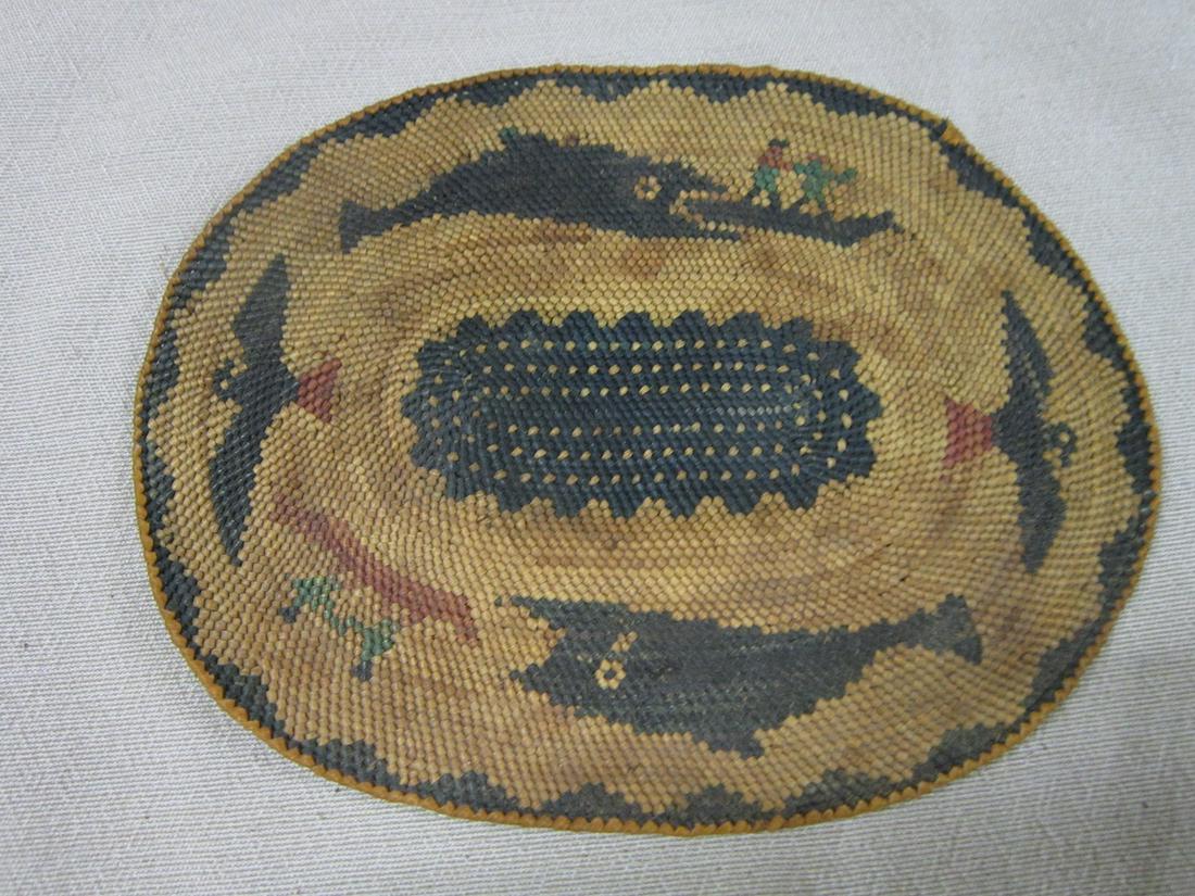 Flat Tinglit Trivet: Flat Tinglit trivet, amazing Museum quality Tinglit trivet, with whales chasing humans in boats, mid 19th c. or earlier. Also with 2 Great Eagles. 8" l. x 7" w. Almost flat. Condition: Excellent for a