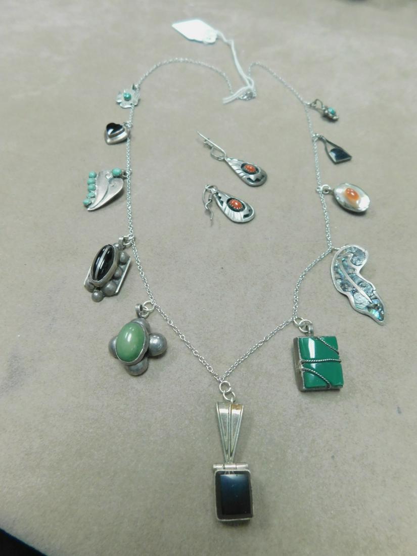 Asst. Mexican & Nat. American Charms Necklace: Asst. Mexican and Nat. American Charms Necklace, 22" silver chain with eleven charms with abalone, onyx, turquoise, etc. and 1" earrings with coral. CONDITION: Very good vintage, normal wear and patin