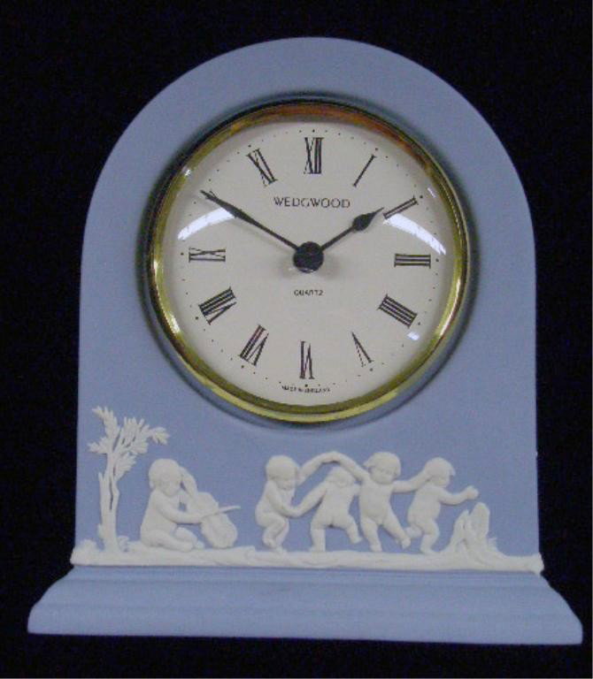 Wedgwood Jasperware Clock: Wedgwood light blue Jasperware 4 3/4" x 4" battery operated clock. Condition: Very good with no damage.
