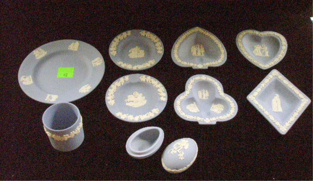 Wedgwood Jasperware Group: Wedgwood light blue Jasperware group, 4 piece card suit ashtray set, two 4 3/4" round ashtrays, 2 1/4" cigarette holder, 10 1/2" plate & 1 3/4" x 2 3/4" x 1 3/4" egg form box. Condition: Very good wit