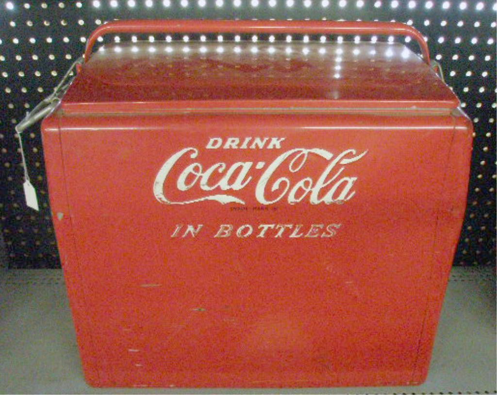 1950's Coca Cola Picnic Cooler: 1950's Cavalier Corporation painted metal Coca Cola 17 1/2" x 15 1/2" x 13" picnic cooler with original bottle opener attachment & tray insert. Condition: Areas with wear, scratches & or loss, dented