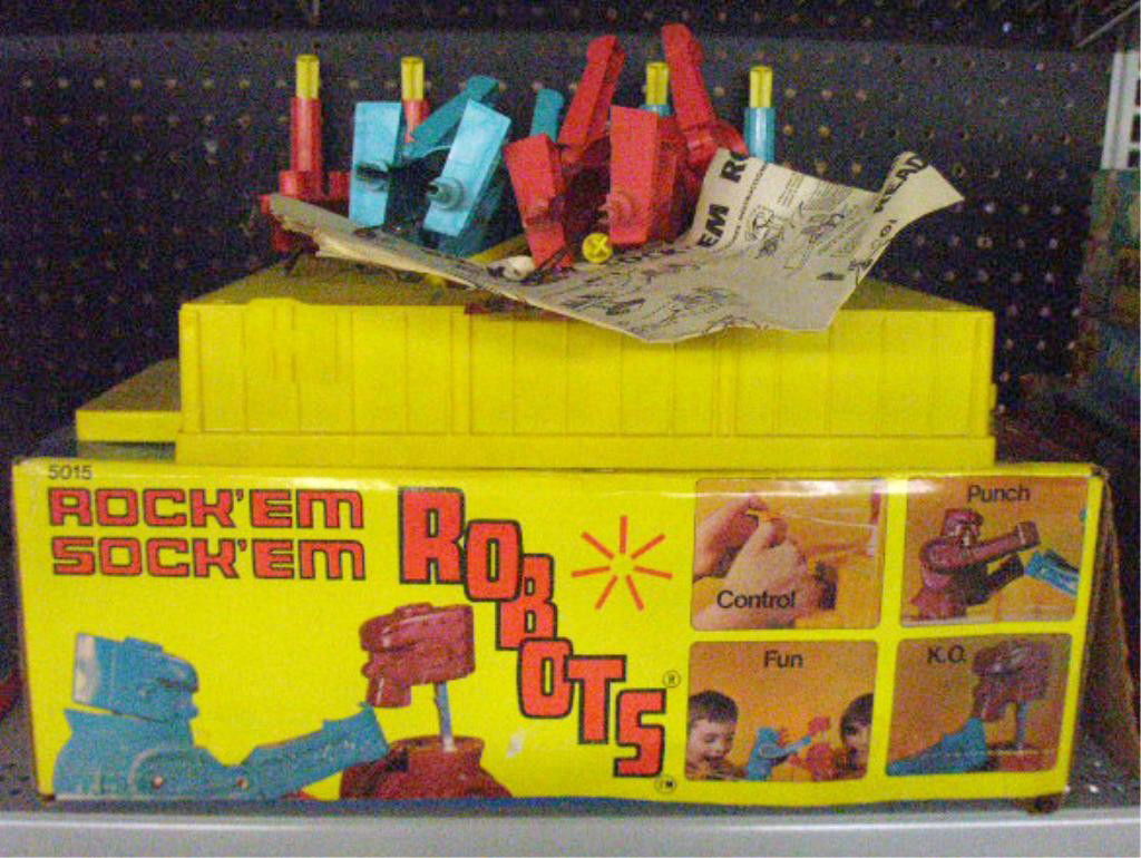 1960's Marx Rock'em Sock'em Robots Game: 1960's Louis Marx & Co. Inc. Rock'em Sock'em Robots game with original box. Condition: Unassembled & appears to be complete, box has wear & tearing.