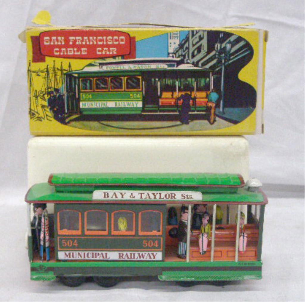1950's Japan Tin San Francisco Cable Car: 1950's Japanese tin friction Municipal Railway San Francisco Cable Car with original box. Condition: Works, overall very good condition with no damage, box has wear & tearing.