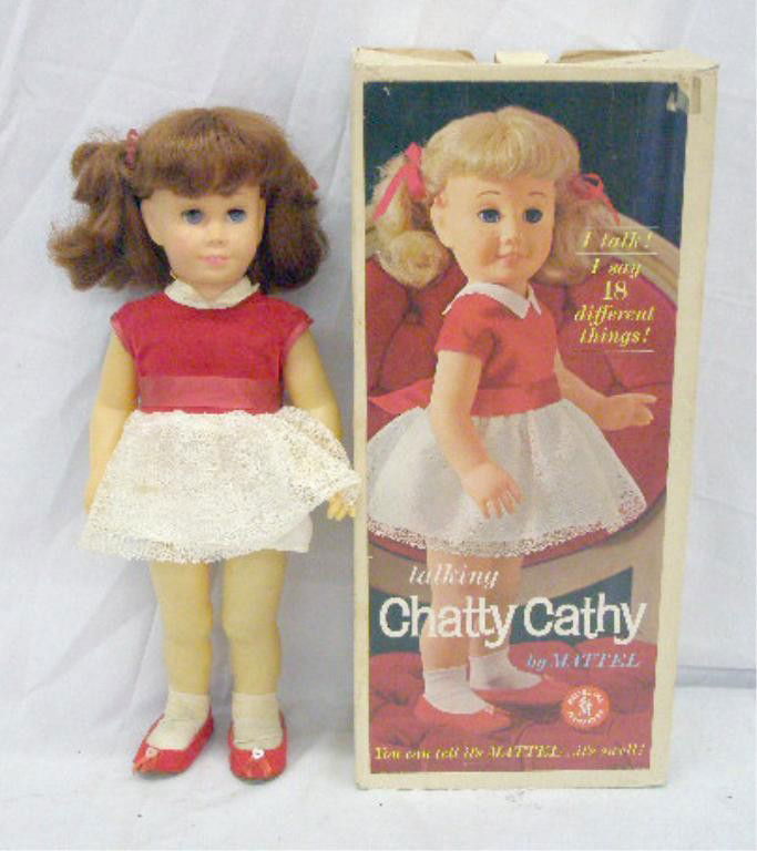 1960 Mattel Chatty Cathy Doll: 1960 Mattel Inc. 19" Talking Chatty Cathy doll with original box. Condition: Not working, staining on clothing, 1 shoe has separation at back part, doll itself is in very good condition, box has wear.