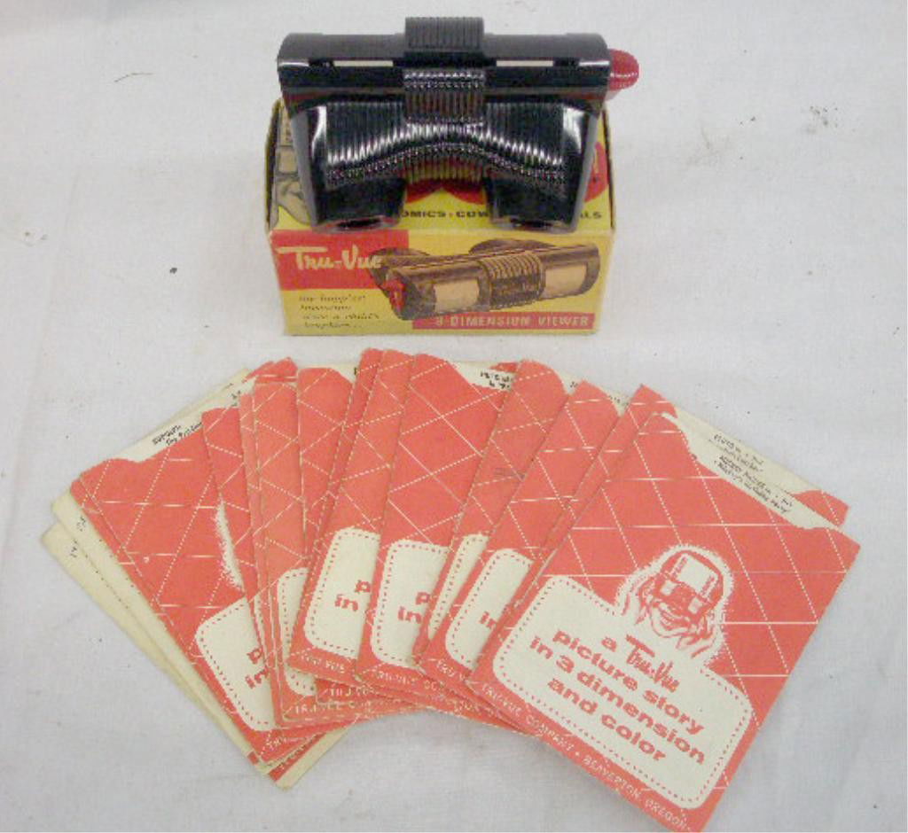 1950's Tru Vue Viewer & Viewing Cards: 1950's Tru Vue 3-Dimension viewer with original box & 21 assorted Walt Disney & other viewing cards. Condition: Viewer is very good with no damage, box has minor wear, cards & holders have some wear.