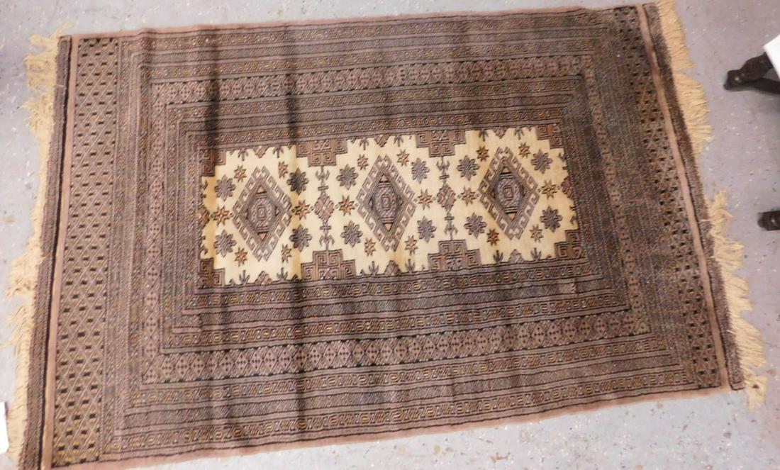 Bokara Throw Rug: Bokhara Throw Rug, brown and cream geometric field and borders 3.4' x5.2'. CONDITION: Very good, light usage.
