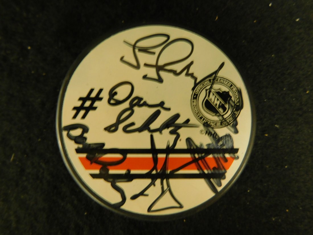 Phila. Flyers Autographed Hockey puck: Phila. Flyers Autographed Hockey puck, on original official NHL Flyers Autograph puck including: Larry Zeidel, Joe Watson, Ross Fitzpatrick (on one side), Pelle Lindbergh?, Dave Schultz, plus three ot