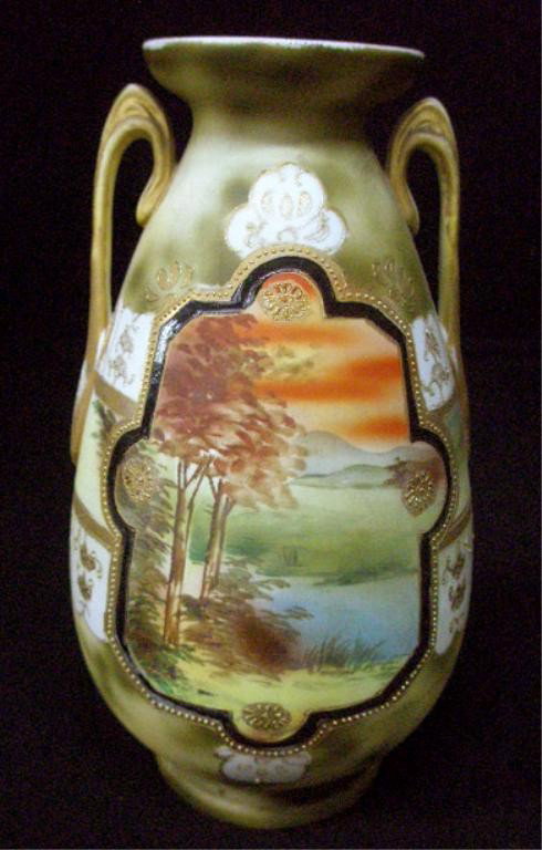 Nippon Porcelain Vase: Nippon porcelain vase, scenic painted panel with beaded border, late 19th c., hgt 10". Condition: Paint loss to rim & handles.