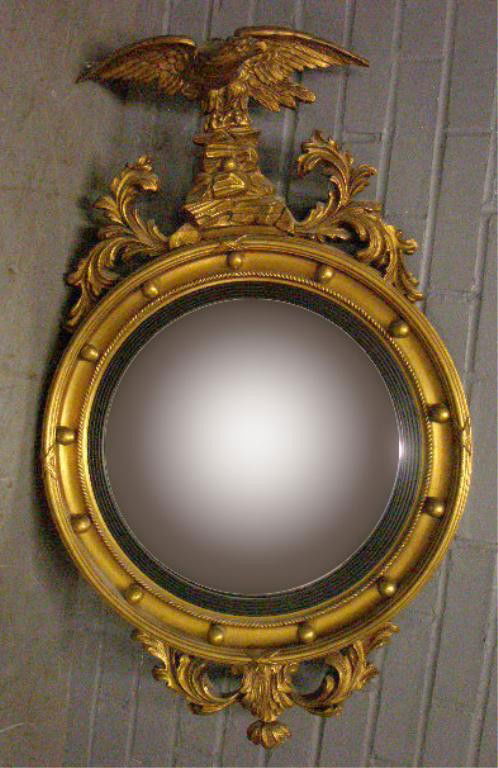 Eagle Crested Convex Mirror: Eagle crested convex mirror, gessoed gilt over wood, acanthus scroll, rope & ball embellishments, early to mid 20th C., 36" x 22 1/2". No issued identified.