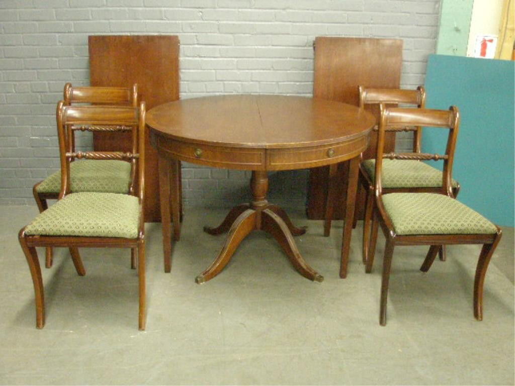5 Pc Dinette Set: 5 Pc Dinette set, Duncan Phyfe style, mahogany, includes: 43" diameter pedestal table with fold down legs & two 20" leaves & 4 slip seat side chairs, early to mid 20th c. Condition: No issues identifi