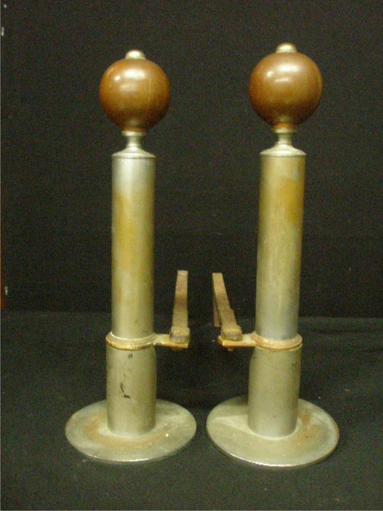 Pr Art Deco Andirons: Pr Art Deco Andirons, nickel plated brass & copper ball & column form, early 20th c. hgt 15". Condition: Areas of wear to nickle exposing the copper & or brass beneath.