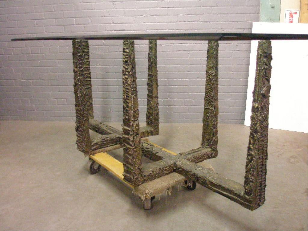 Paul Evans Signed Dining Room Table: P[aul] E[vans] signed dining room table, 6 sculpted cast metal legs on flat stretcher base, 3/4" thick plate glass top 43 1/2" x 82". Condition: Surface scratches & tiny corner chip to plate glass top