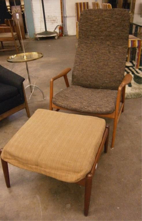 DUX Sweden Recliner: DUX Sweden recliner, teakwood, original brown's cloth upholstery, along with a unmatching Denmark teakwood ottoman's chair hgt 41", c. 1960's. Condition: Staple repair to interior corner slat of ottom