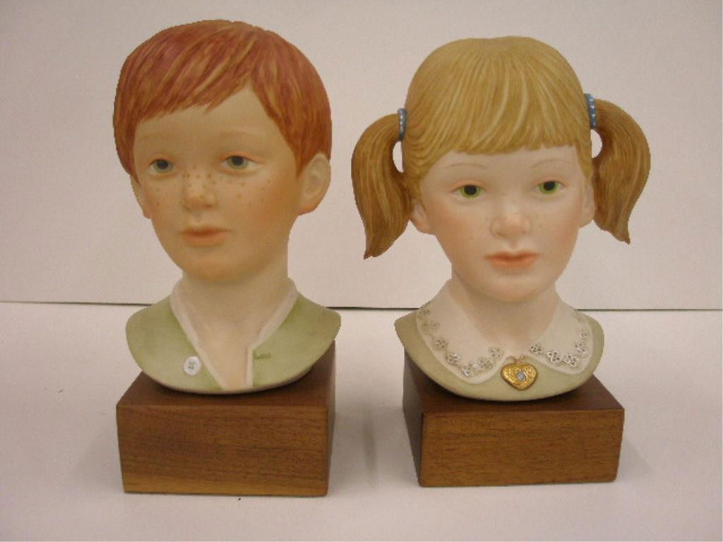 Cybis Jeremy & Jessica Bust Figures: Cybis porcelain Jeremy & Jessica 7" bust figures on wood bases. CONDITION: Very good with no damage.