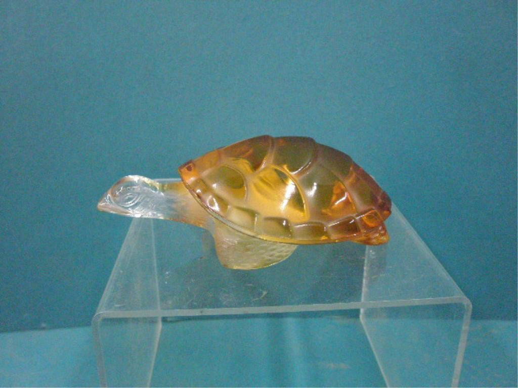 Lalique Glass Caroline Turtle Figure: Lalique signed frosted amber and clear glass #11639 Caroline turtle 6" figure. CONDITION: Very good with no damage.