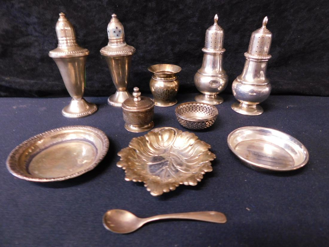 Sterling Silver Group: Sterling silver group includes: pair 4 1/2" solid salt & peppers, 1 3/4" covered saccharin jar; 1 7/8" h monogramed toothpick holder; 3 1/2"L leaf dish 2 5/8" d monogramed coaster; 3 1/4" coaster, pie