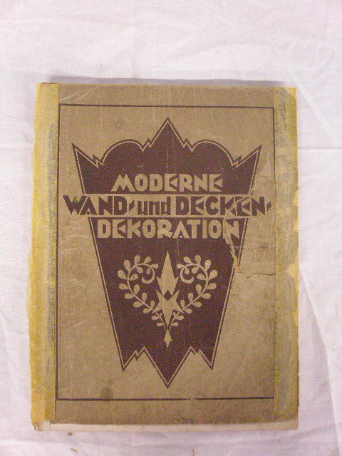 1920's German Interior Design Book: 1920's Moderne Wand Und Deckendekoration (Modern Wall & Ceiling Decoration), German interior design book with 66 chromolithograph plates showing wall & ceiling decorations. CONDITION: Front cover is d