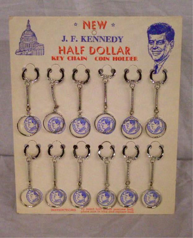 John F. Kennedy Key Chain Display: 1960's John F. Kennedy half dollar key chain coin holder 9 1/2" x 11 3/4" store display card . CONDITION: Very good with no damage