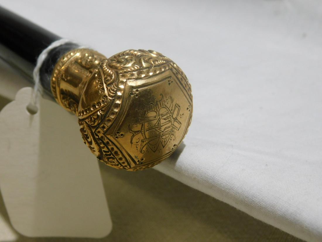 Gold Knob Dress Cane: 14k Gold knob dress cane, Handle: gold with touch marks, repousse & etched arched and scroll design, (57) monogramed top. Shaft: Ebony. Ferrule: steel and iron. Length; 35 3/4". Vintage 19th/ 20th c.