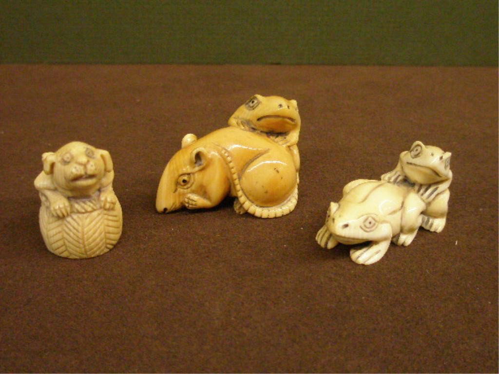 3 Chinese Carved Ivory Netsukes: Three Chinese carved ivory Netsukes 1 5/8" rat & frog, 1 5/8" two frogs, 1 1/4" dog in basket & rabbit, all signed, 19th C. [8]