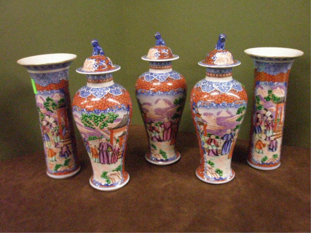 Chinese 5 Piece Mandarin Garniture Set: Chinese five piece Mandarin pattern porcelain garniture set, in blues & reds with intricate painted court life scene panels, 19th C., includes: three covered 9 5/8" jars & two cylindrical 8 5/16" vase