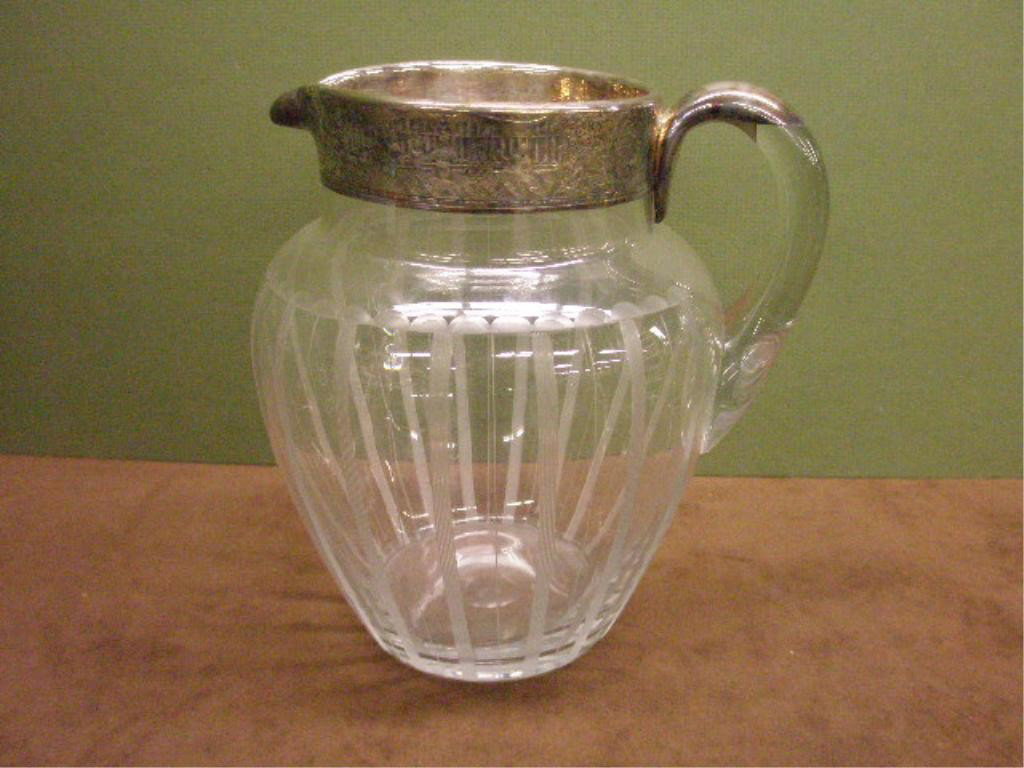 Silver Overlay Glass Water Pitcher: Vintage Hawkes style clear glass 8" water pitcher with sterling silver overlay top rim & handle.
