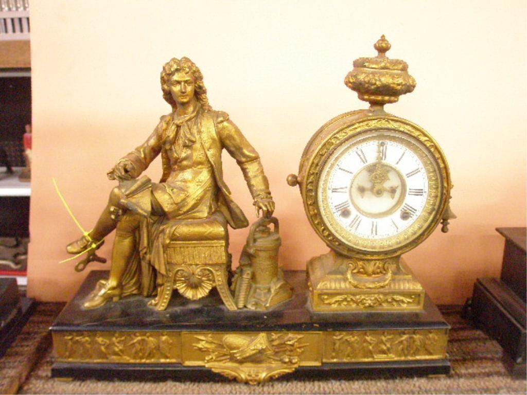 Ansonia Denis Papin Figural Mantle Clock: c.1886 Ansonia Clock Company "Denis Papin" 16" x 19" 6 1/2" figural mantle clock, 8 day time with half hour gong striking movement, porcelain enamel face.
