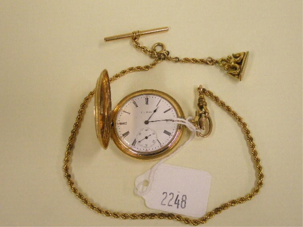 Elgin GF Pocket Watch, Chain & Fob: Elgin gf Hunter case, pocket watch, chain & fob, Keystone gold filled engine turned case with monogramed cartouche, 15 jewel, 36 mm movement, serial #12221324; gold filled rope chain with fleur de lis