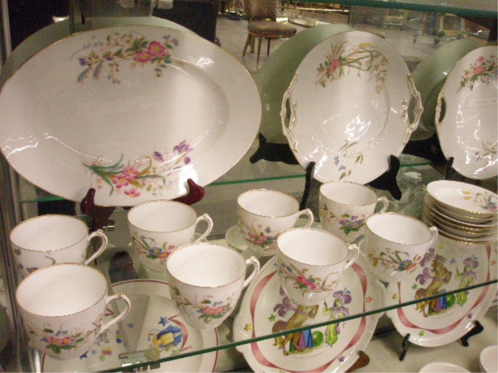 Antique T&V Limoges China Set: Antique T&V (Tressemanes & Vogt) Limoges 35 piece china set, hand painted floral design, (12) 7 3/8" plates, (8) cups, (8) saucers, (7) 4 1/2" bowls, (2) 10" platters, 13 1/2" oval platter, 11" covere