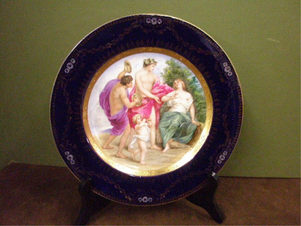 Bloch & Co. Porcelain Courting Scene Plate: c. 1900 Bloch & Co. Austrian porcelain courting scene 9 3/8" plate with transfer & painted center design, enamel & draped gilt floral border.