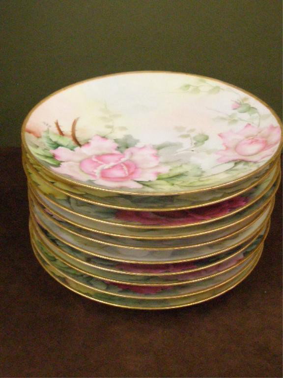 Bavarian Hand Painted Porcelain Plates: Set of ten Thomas Sevres Bavaria hand painted porcelain 9" plates with varying floral designs.