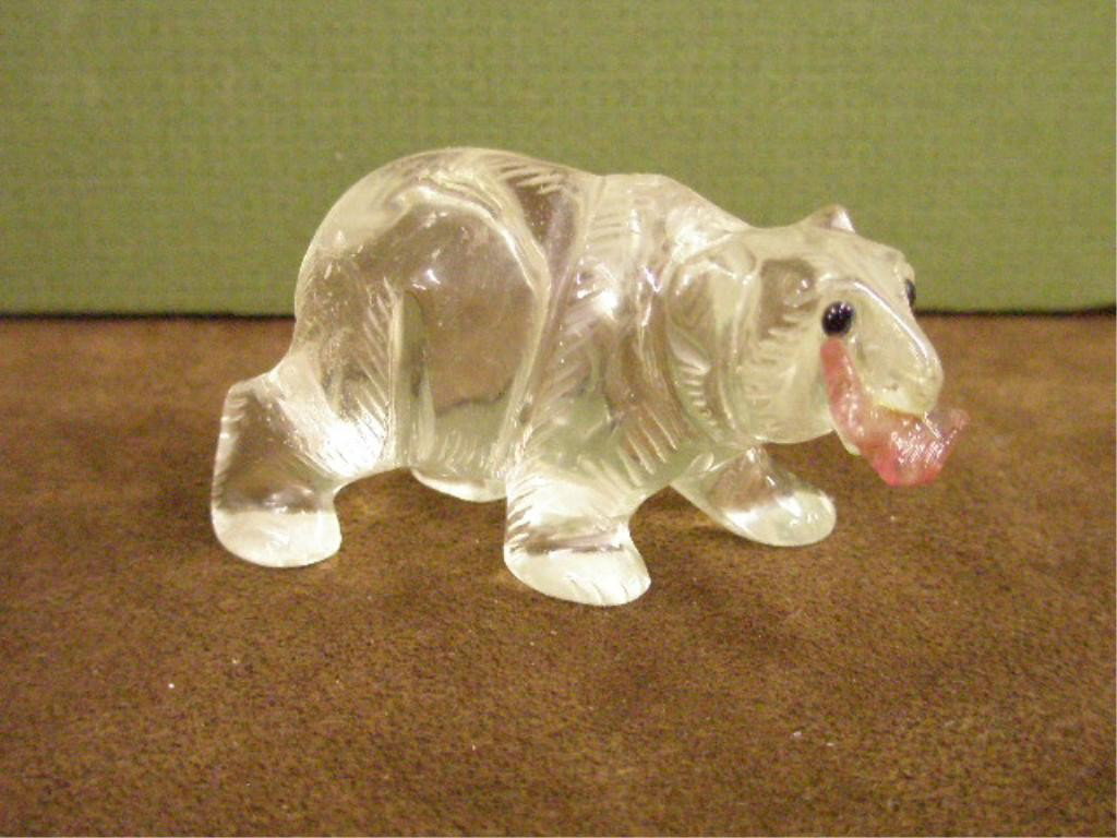 Rock Crystal Polar Bear Figure: Rock crystal 1 1/4" x 2 1/2" polar bear figure with quartz fish in mouth.