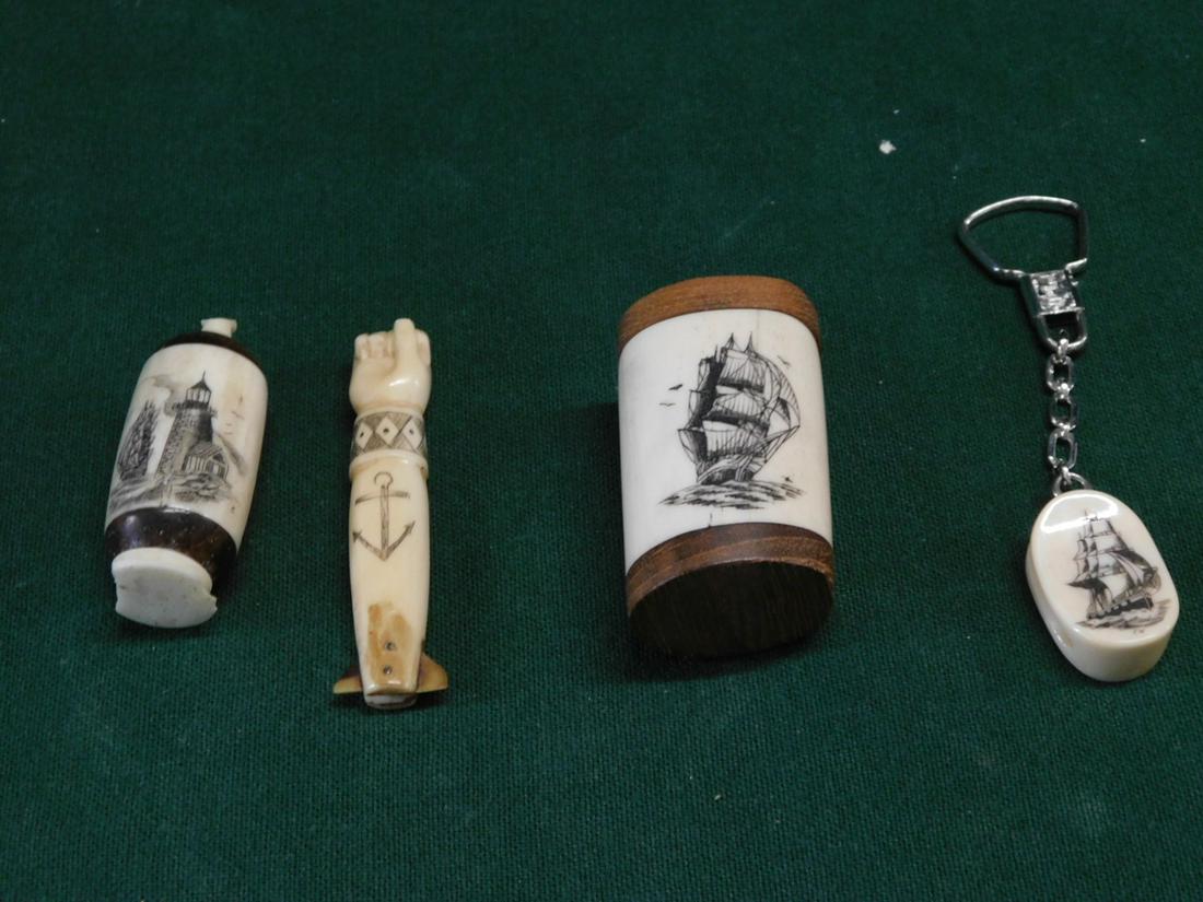 4 Scrimshaw Pieces: Four Scrimshaw Pieces, includes: bottle form with light house and boat, 2", wood capped tooth segment with ship 2"h, carved arm with anchor and "N" 2 1/2"l and a pulley form with ship key chain fob, s