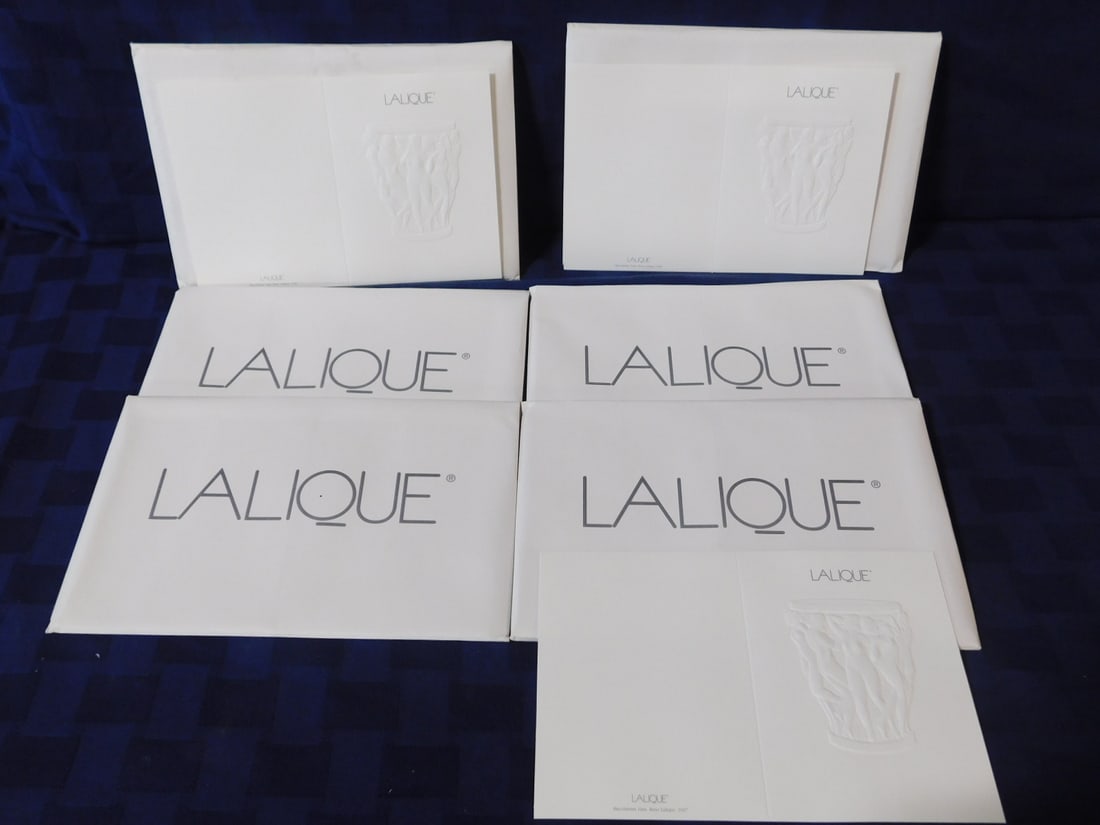 Lalique Embossed Stationary: Lalique Embossed Stationary, six packs of Bacchantes vase embossed, ten cards and envelopes in a pack. CONDITION: Vintage, new, one with a stained outer envelope.