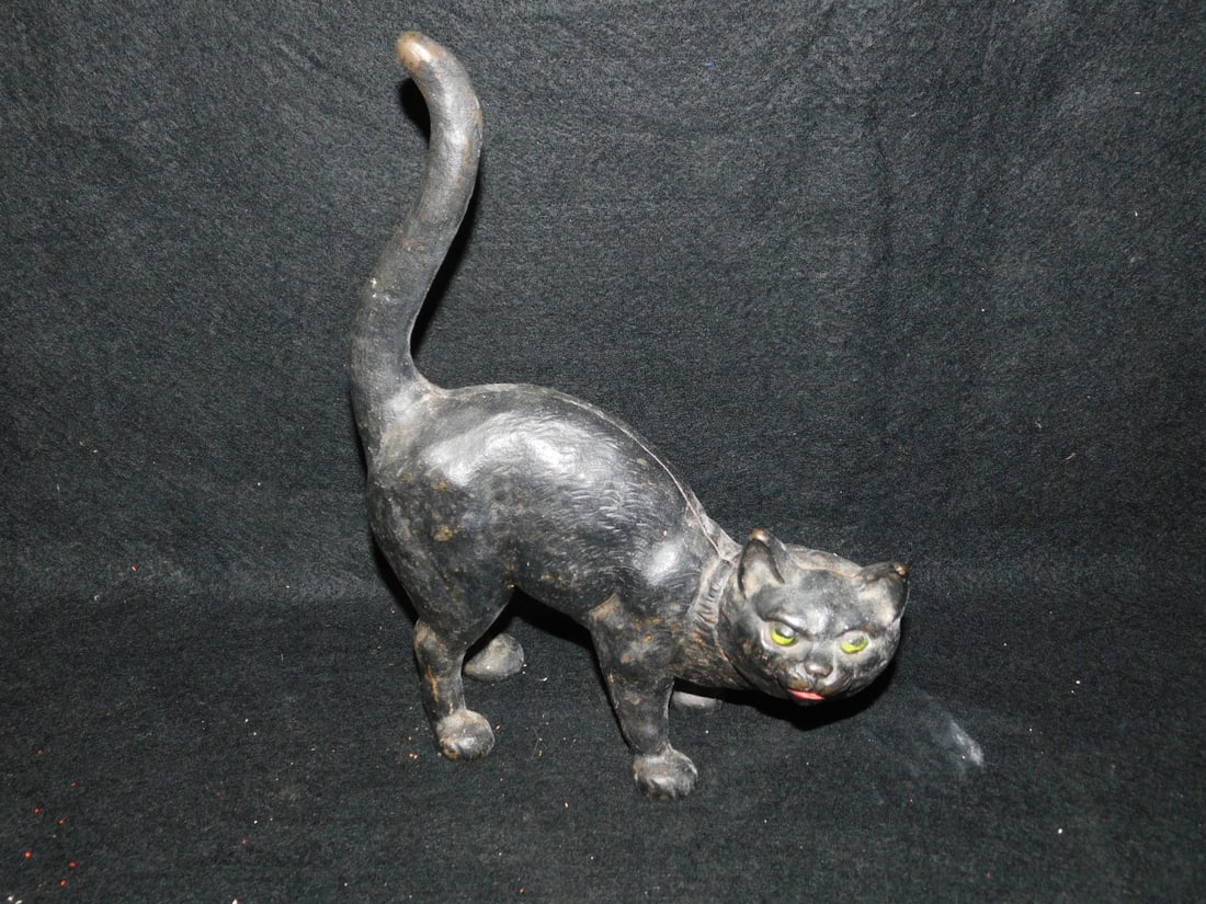 Cat Door Stop: Cat Door Stop, vintage cast iron, painted eyes, possibly Hubley, 10 3/4"h, 8"l. CONDITION: Very good.